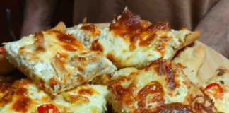 Πίτσα με τυρί κρέμα: Μια συνταγή για τέλειο αποτέλεσμα! Μια σπιτική πίτσα με τυρί κρέμα, με πλούσια γέμιση από τυριά και λαχανικά