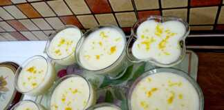 Ρυζόγαλο με άρωμα πορτοκαλιού: Το παραδοσιακό γλυκό που όλοι αγαπάμε! Ρυζόγαλο με άρωμα πορτοκαλιού, σερβιρισμένο σε λευκό μπολ, με ξύσμα πορτοκαλιού από πάνω