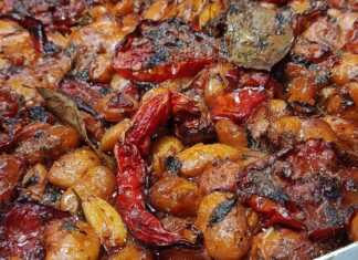 Γίγαντες στο φούρνο με λαχανικά: Η πιο νόστιμη και εύκολη συνταγή! Ένα ταψί με λαχταριστούς γίγαντες στο φούρνο με λαχανικά, έτοιμο για σερβίρισμα