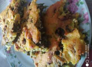 Ένα κομμάτι από την παραδοσιακή βλάχικη χορτόπιτα χωρίς φύλλο (Μοσόντρα), με την τραγανή κρούστα της.