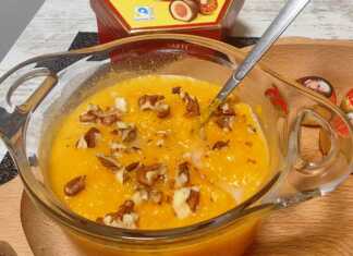 Κρέμα Κολοκύθας: Η οικογενειακή συνταγή που ξυπνάει μνήμες! Ζεστή κρέμα κολοκύθας σε μπολ, πασπαλισμένη με καρύδια και κανέλα.