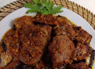 Μελωμένο Χτένι Μοσχαρίσιο με Μελιτζάνες Φούρνου σε ταψί, έτοιμο.