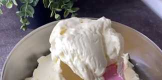 Απαλή κίτρινη κρέμα ζαχαροπλαστικής βουτύρου σε μπολ, έτοιμη για γέμιση γλυκών