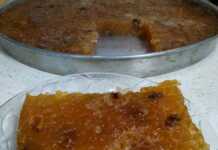 Χαλβάς Φαρσάλων με χρυσαφένια καραμελωμένη επιφάνεια και αμύγδαλα, σερβιρισμένος σε ταψί