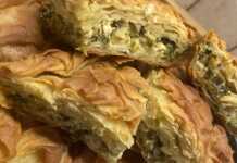 Κολοκυθόπιτα με Χειροποίητο Φύλλο Μεγάλο στρογγυλό ταψί με ψημένη κολοκυθόπιτα με χρυσαφένιο και τραγανό φύλλο