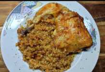 Μπουτάκια Κοτόπουλου με Αρωματικό Πλιγούρι στο Φούρνο Ζουμερά μπουτάκια κοτόπουλου με κόκκινη πικάντικη κρούστα σερβιρισμένα με αρωματικό πλιγούρι από το ίδιο ταψί