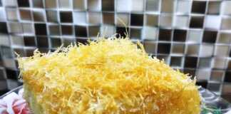 Γαλακτομπούρεκο με Φύλλο Καταΐφι: Η πιο Τραγανή Παραλλαγή του Κλασικού Γλυκού! Ένα χρυσαφένιο ταψί με γαλακτομπούρεκο που έχει τραγανό φύλλο καταΐφι στην επιφάνεια και πλούσια κρέμα να ξεπροβάλλει.