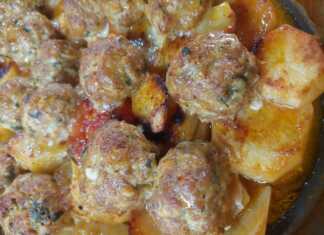 Ζουμερά κεφτεδάκια ψημένα στο φούρνο, με ελαφρώς ροδισμένη επιφάνεια, σερβιρισμένα σε ταψί.