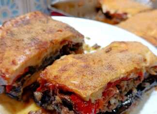 Ένα ταψί με λαχταριστό, καλοψημένο μουσακά με χρυσαφένια μπεσαμέλ και πλούσιες στρώσεις λαχανικών.