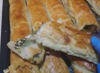 Μια ολόκληρη σπανακόπιτα στο ταψί με χρυσαφένιο, τραγανό φύλλο σφολιάτας