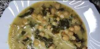 Ένα βαθύ πιάτο με χυλωμένα ρεβύθια και σπανάκι, περιχυμένα με λευκό ταχινολέμονο και πασπαλισμένα με φρέσκο άνηθο.