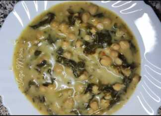 Ένα βαθύ πιάτο με χυλωμένα ρεβύθια και σπανάκι, περιχυμένα με λευκό ταχινολέμονο και πασπαλισμένα με φρέσκο άνηθο.