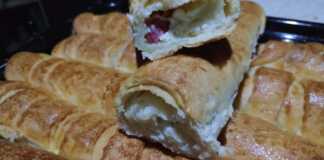 Χρυσαφένια αφράτα ψωμάκια με σχισμές στη ζύμη γεμισμένα με καπνιστό σαλάμι και τυρί γκούντα